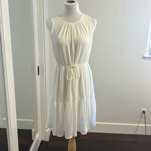 Darling mid-length cream color chiffon dress